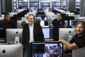 TO GO WITH AFP STORY BY CONSTANCE DE CAMBIAIRE
(From L) 42 School vice director Kwame Yamgnane, president Xavier Niel, vice director Florian Bucher, and director general Nicolas Sadirac pose at the school campus in Paris on November 24, 2014. Known simply as 42, the private computer programming school was created by French entrepreneur Xavier Niel, who hopes to "train the Bill Gates of the future". AFP PHOTO/MARTIN BUREAU / AFP PHOTO / MARTIN BUREAU